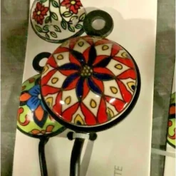 APPENDINO GANCIO PARETE APPENDIABITI METALLO CERAMICA DECORI ASS. 13X4CM 749346