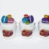 TRIS DI BARATTOLI IN CERAMICA CON TAPPO DECORO DI DOLCI MACARONS COLORATI 14X10
